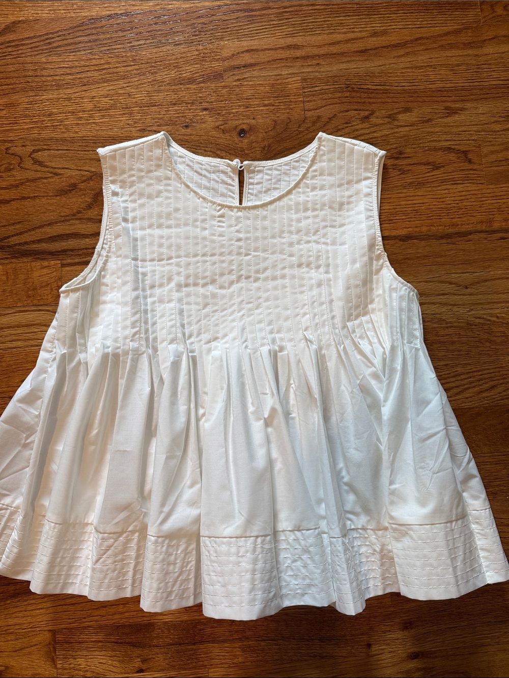 Commense White Sleeveless Pintuck Peplum Blouse